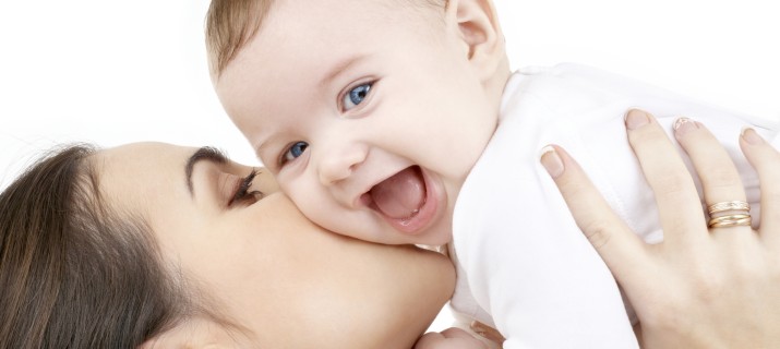 picture of happy mother with baby over white